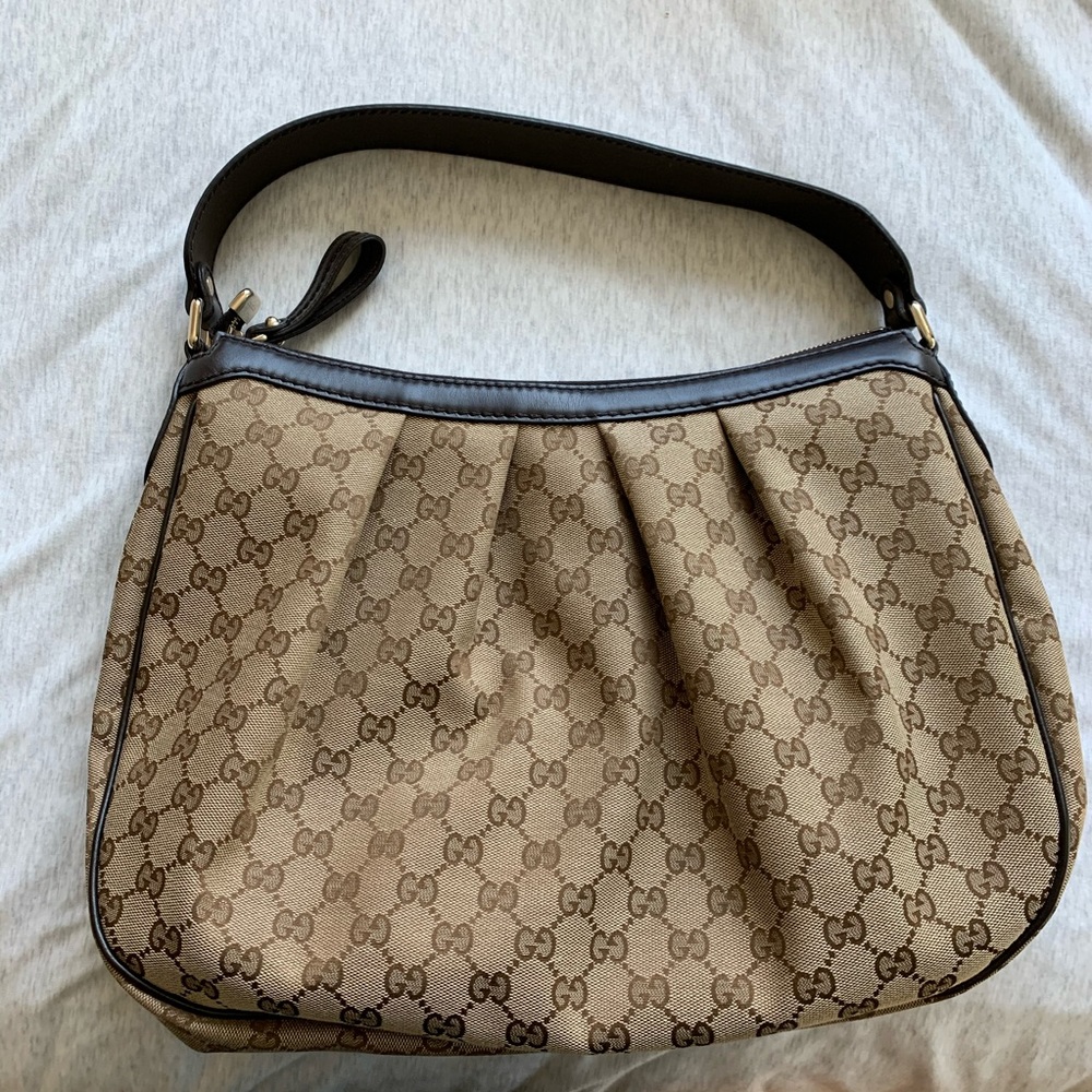 Authentic Gucci Monogram Saddle Bag